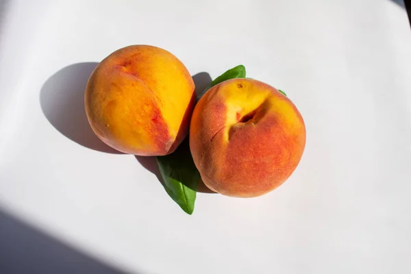 fresh peaches on table. Beautiful red yellow peaches. close up