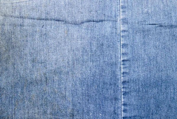 Texture Blue Denim Fabric Yellow Stains Two Pieces Fabric Stitched — Stock Photo, Image