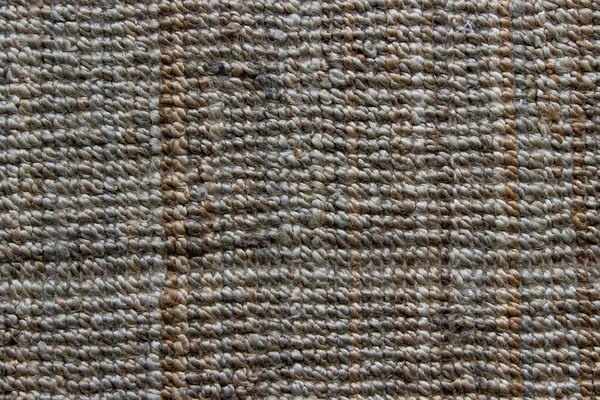 Kaba bir hasır halı dokusu.