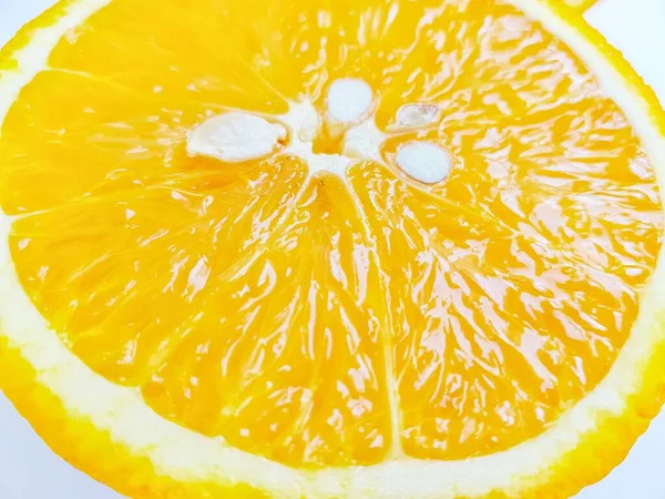 Juicy bright sweet orange on a white background close-up. Place for the buyers text. — Stock Photo, Image