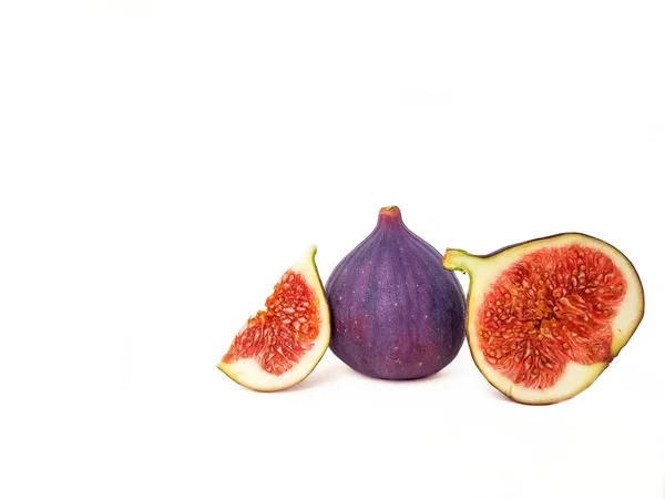 Bright juicy ripe figs on a white background. — Stock Photo, Image