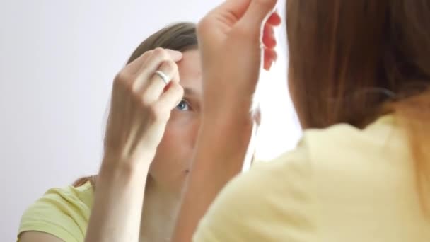 Beautiful Girl Treats Pimples Looking Mirror — Stock Video