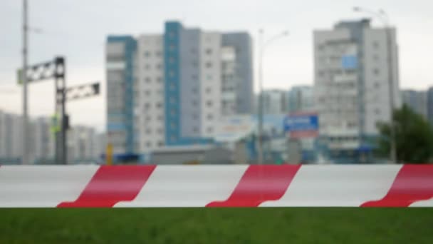 Barrier Tape Fluttering Wind City Buildings Background — Stock Video