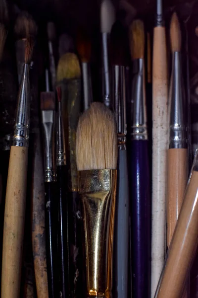 Set of different artist brushes. Wallpaper. Close-up. Background. Collection of brushes for creativity. Horizontal.