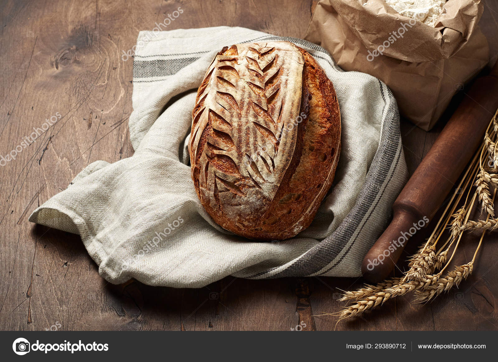 https://st4.depositphotos.com/3581801/29389/i/1600/depositphotos_293890712-stock-photo-freshly-baked-artisan-sourdough-bread.jpg