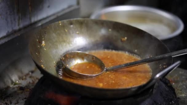 Cooking Red Chutney Gravy Indian Pan Kadhai Tibetan Momos Dumplings — Stock Video