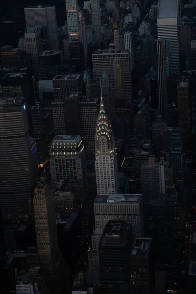 Günbatımında Manhattan, New York 'un havadan görüntüsü Empire State Binası, Times Meydanı, Dünya Ticaret Merkezi, Chrysler Binası ve diğer New York şehrinin gökdelenlerine bakıyor..