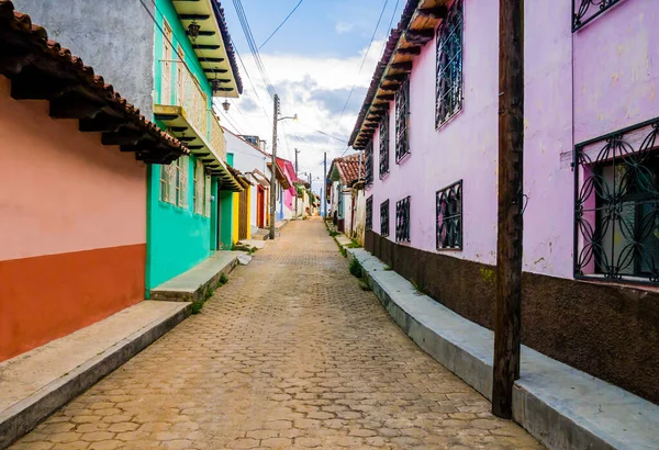 Colorful road with traditional houses in colonial style in San Cristobal de las Casas, Chiapas, Mexico