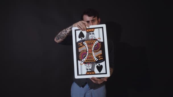 Man showing tricks with cards. Magic, performance, circus, gambling, casino. Show concept - magician showing trick with playing cards — Stock Video