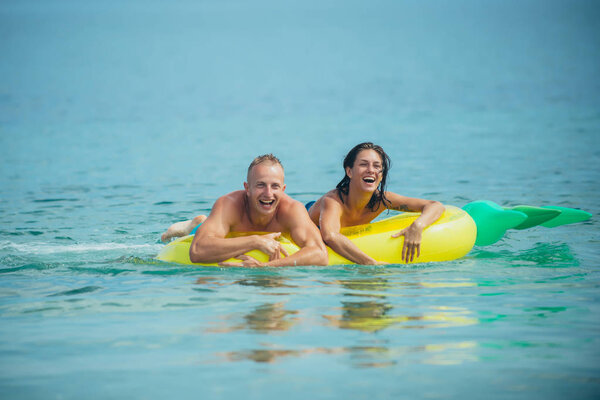 Sexy happy couple on Caribbean sea. sexy happy couple on summer vacation