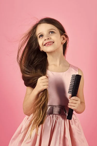 Kids face skin care. Portrait girl face in your advertisnent. Hair care concept with portrait of girl