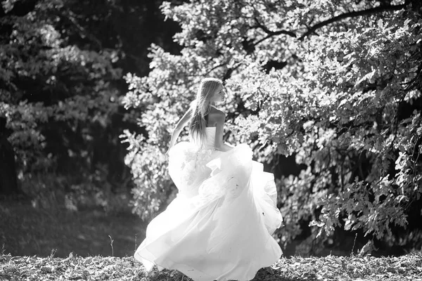 Sensual woman. Bride in beautiful dress outdoor