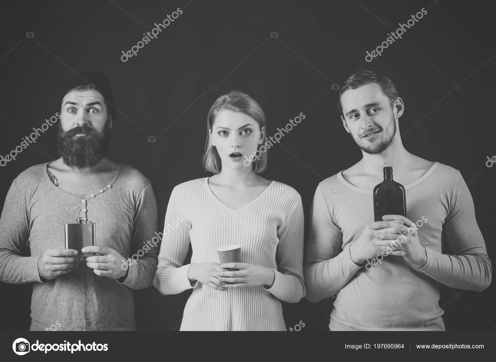 Guys hold cup, flask with alcohol, bottle. Company of friends spend leisure with drinks. addict concept. Alcohol, addiction, leisure pic picture
