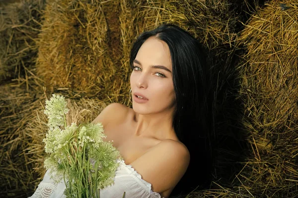 Happy woman. Farm woman relax on hay in barn, agriculture — Stock Photo, Image