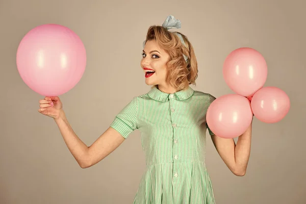 Women face skin care. Portrait women face in your advertisnent. vintage girl on a grey room with balloons. retro