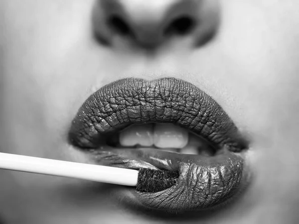 Lipstick. Lip corecction. Coloring lips with gloss stick — Stock Photo, Image