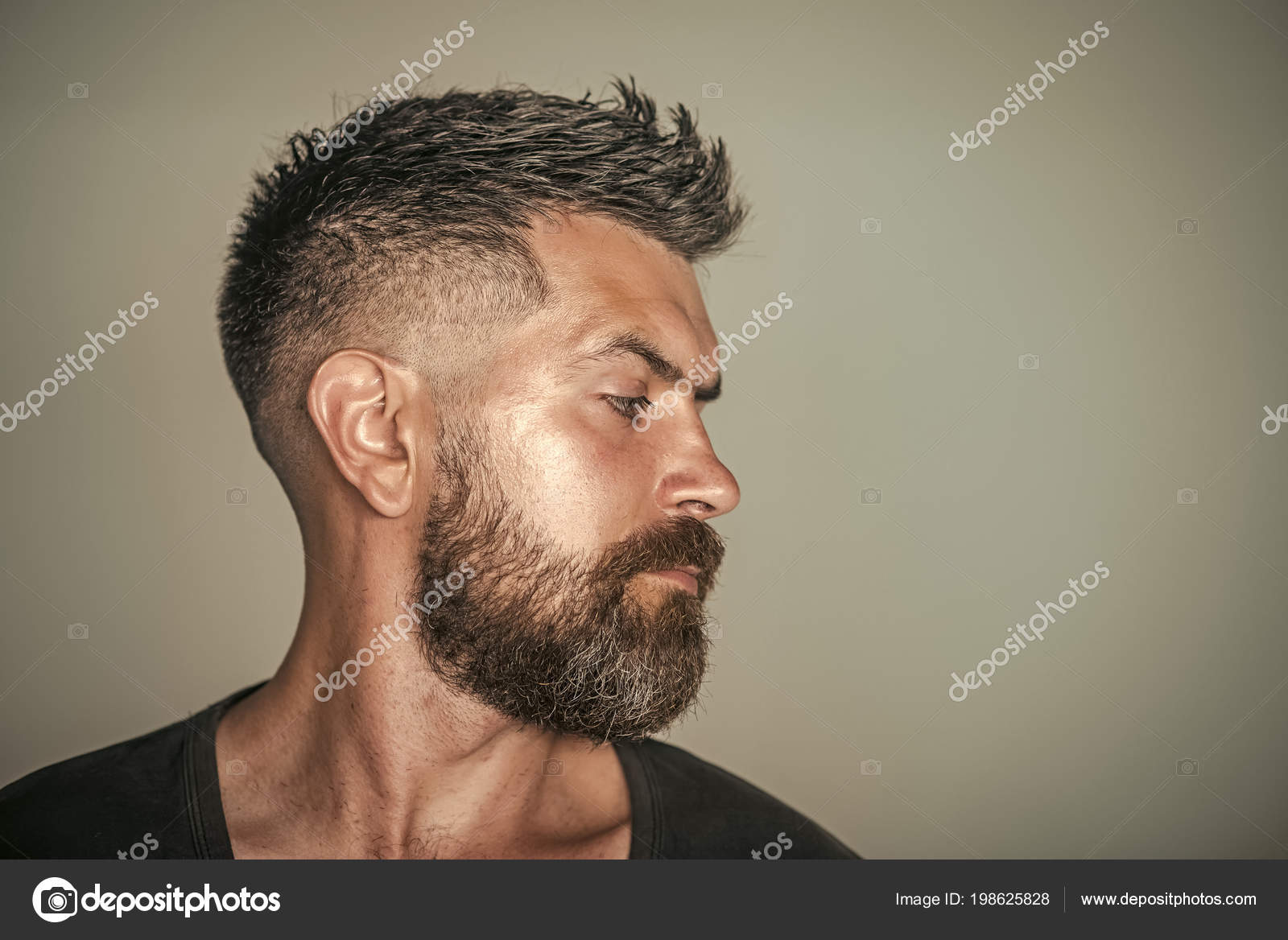 Barber shop. Hair style. Man with bearded face profile and stylish hair  Stock Photo by © 198625828