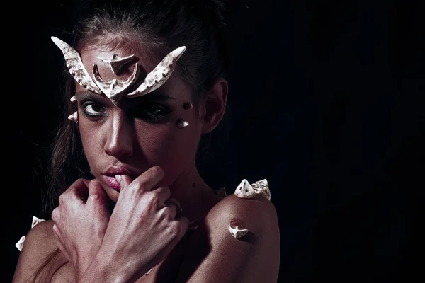 Demon with red skin over black background. Creature from hell, horror concept. Portrait of girl with creative diabolic make-up, Halloween idea — Stock Photo, Image