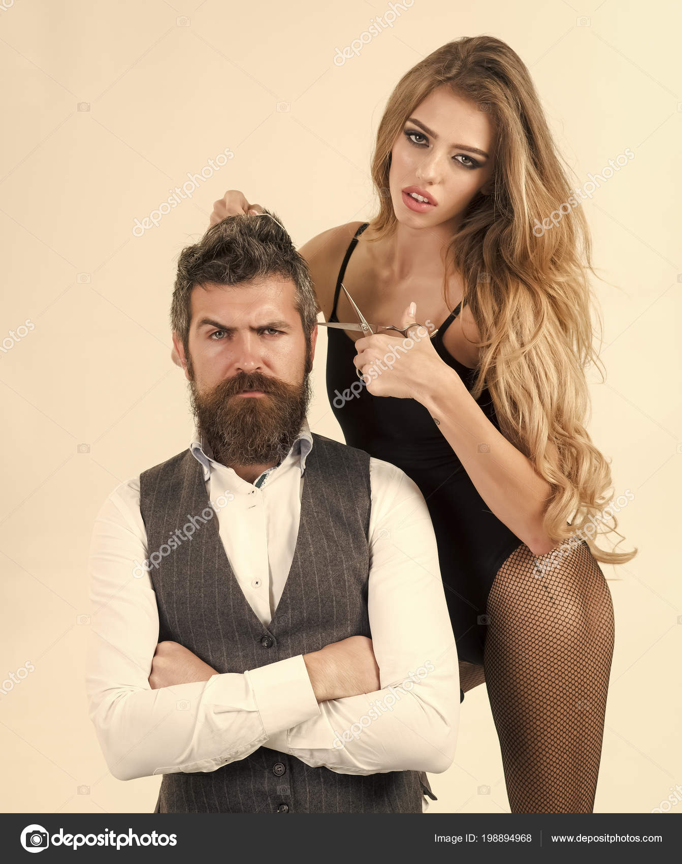 Hairdresser Shears The Client In The Hairdresser Bearded Man And
