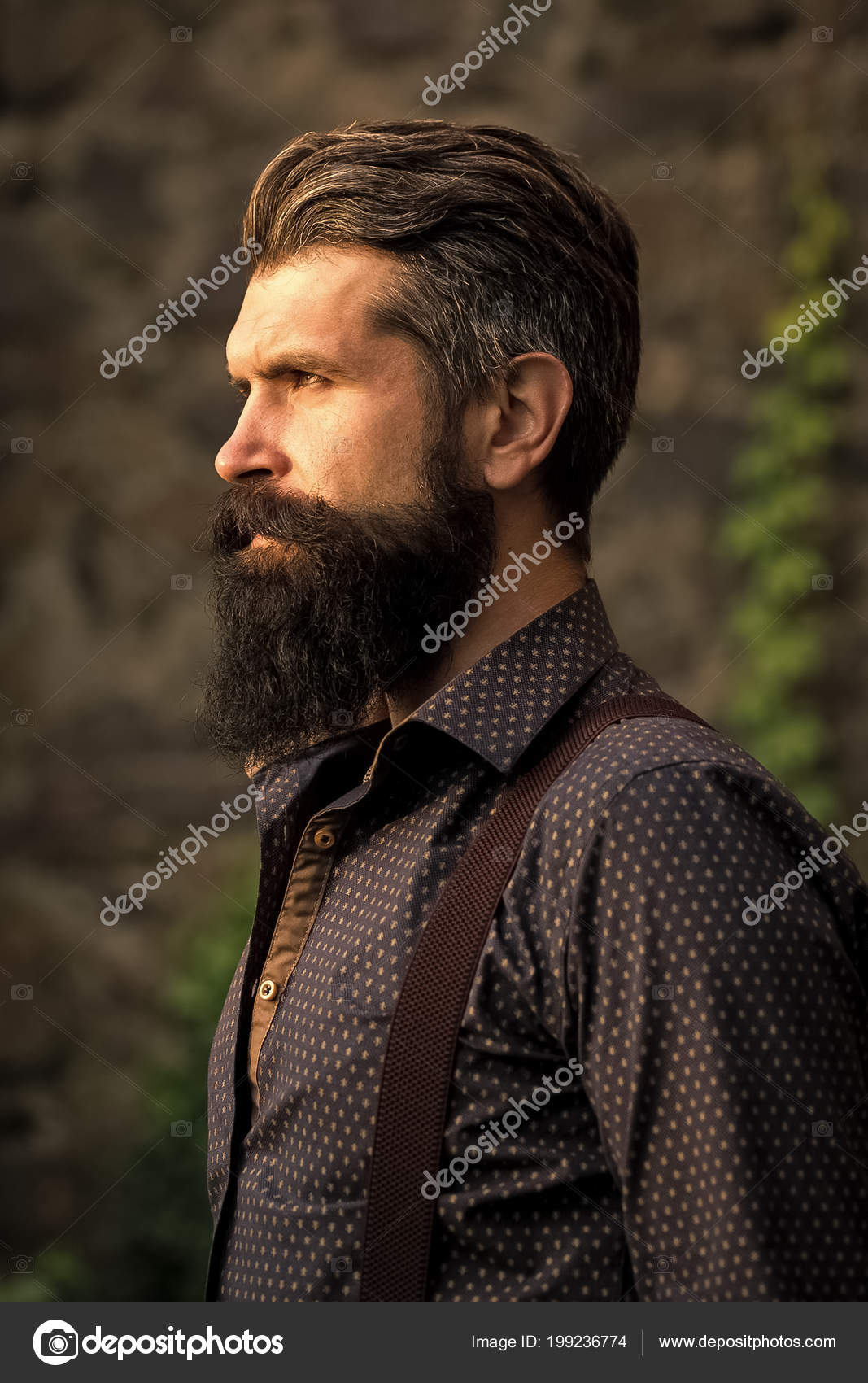 Stylish hairstyle of a beard. Stylish bearded man outdoor Stock Photo by  © 199236774