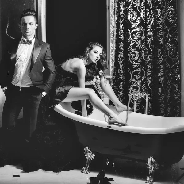 Elite sanitary engineering. elegant couple in bath Stock Image