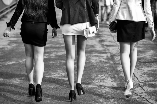 Epilation of the legs. three girls in short skirts — Stock Photo, Image