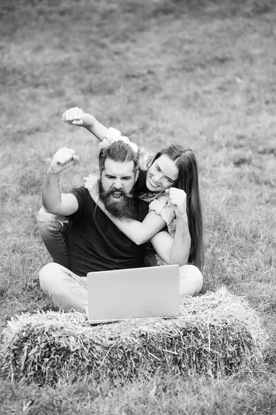 Achieving the goal. couple of student and girl study on laptop on grass — Stock Photo, Image