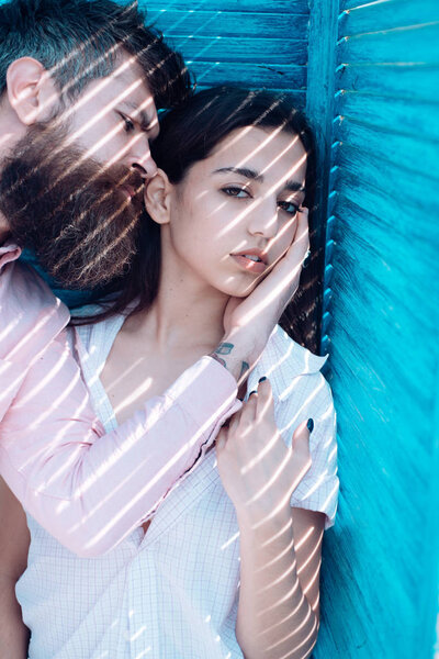 Feeling protected in his hands. Bearded man hug arabian woman. Passion and desire. Sensual couple in love. Enjoy closeness and love