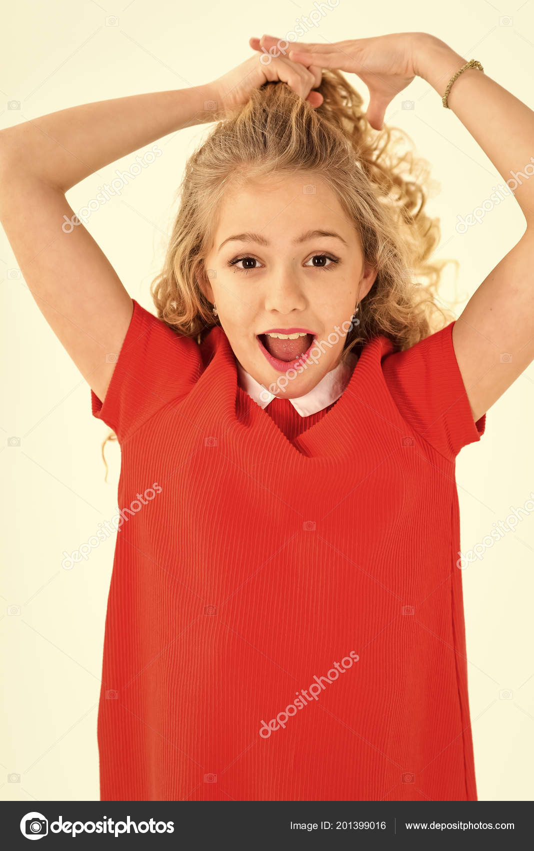 Cheerful girl with curly hair caucasian little girl with curly hair isolated on white background