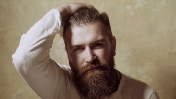 Man looking at himself in a home bathroom mirror — Stock Video