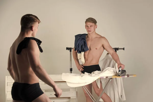 Housework and fitness concept. Two brothers wearing underwear. — Stock Photo, Image