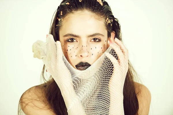 Art make-up. cute girl wearing fishnet stocking on hands — Stock Photo, Image