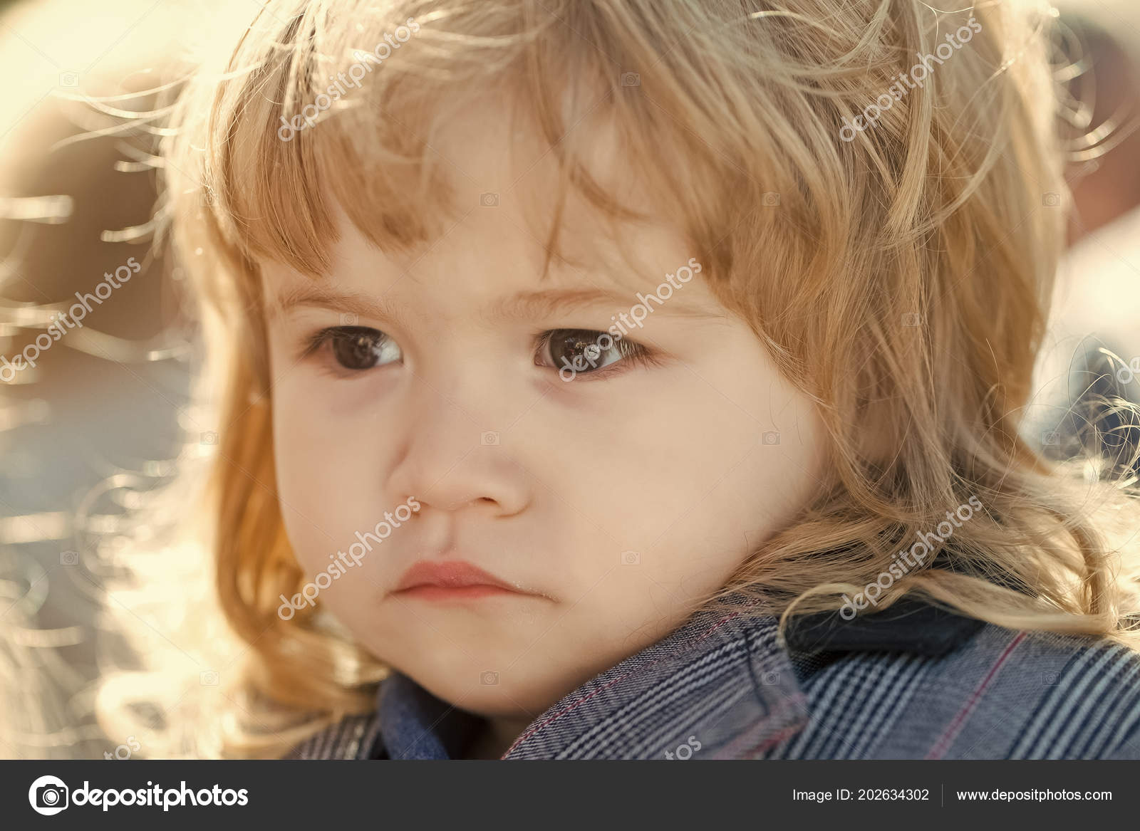 Serious Child Kid With Long Blond Hair Stock Photo C Tverdohlib