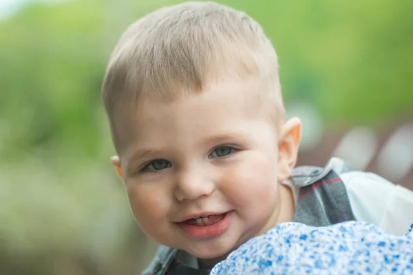 Toddler boy smiling with baby teeth on cute face — Stock Photo, Image