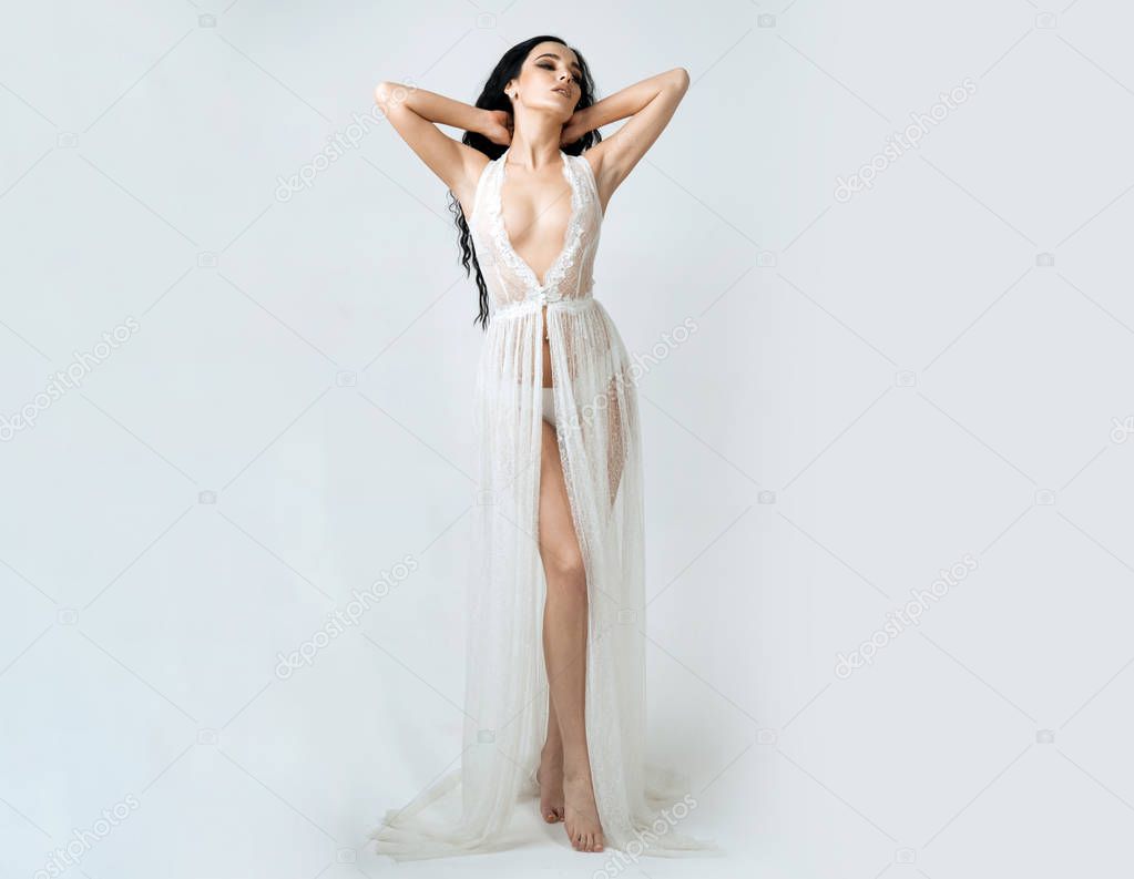 gorgeous. she is simply gorgeous. gorgeous woman in white dress. sexy girl in gorgeous night dress.