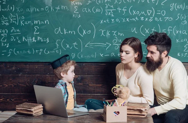 Family concept. Family support. Family relax during break in school classroom. Family and school. A bright future begins here