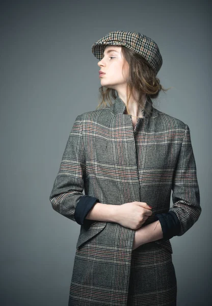 french style. funky beauty. french style of fashion model in checkered beret. french style for woman in checkered jacket. french woman in style.