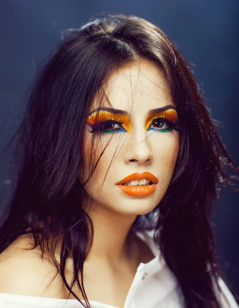 Pretty sexy woman with fashionable bright orange makeup — Stock Photo, Image