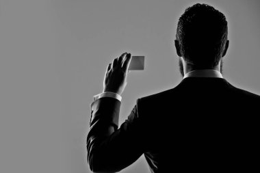 iş ahlakı, gizli iş, finans, adam elinde kart