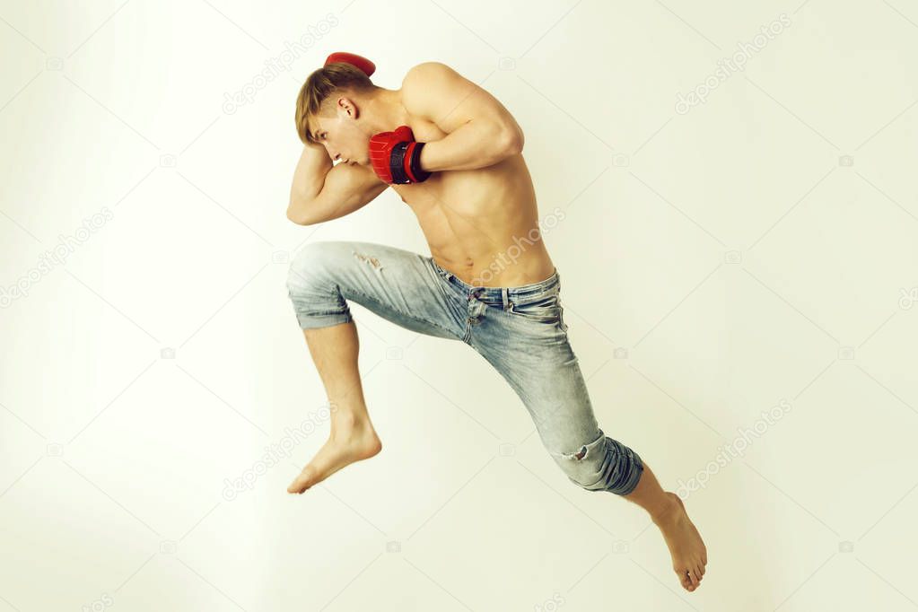 man boxer jumping in boxing stance
