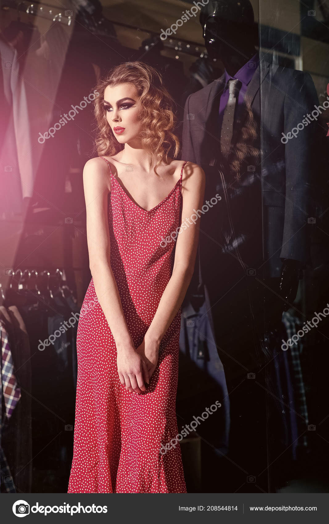 Girl In Red Dress Makeup Long Hair With Fashion Dummy Stock