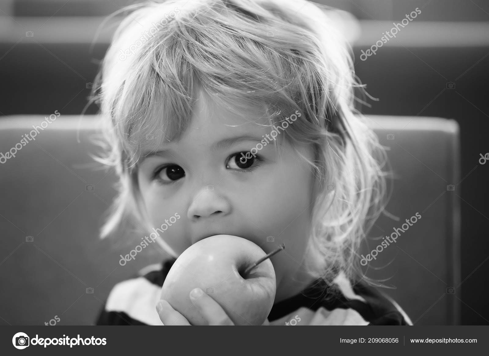 Cute Baby Boy Eating Green Apple Stock Photo C Tverdohlib Com
