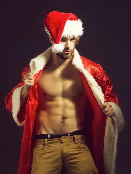 Handsome muscular christmas santa man — Stock Photo, Image