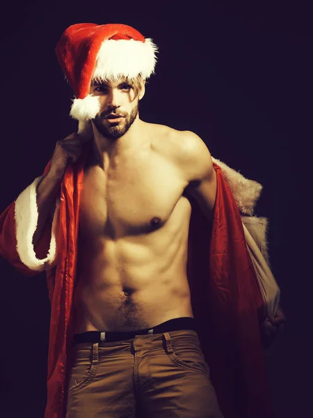 Bello muscoloso Natale Babbo Natale uomo — Foto Stock
