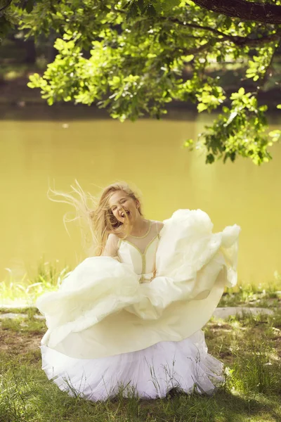 Small girl in white dress outdoor — Stock Photo, Image