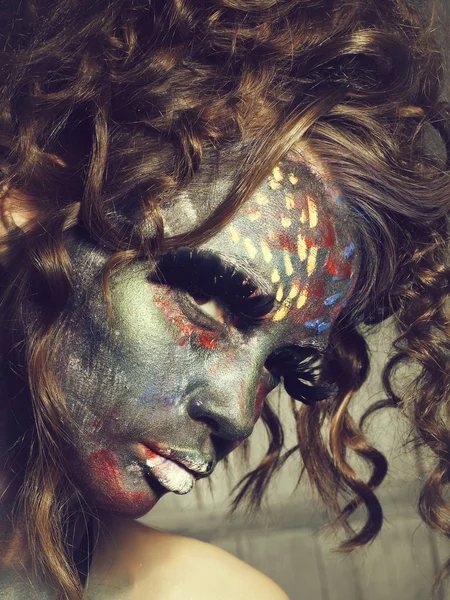 Mulher com rosto pintado — Fotografia de Stock