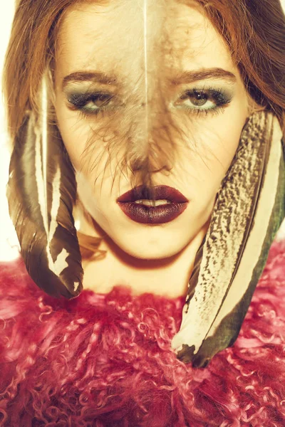 Tribal woman with feather closeup — Stock Photo, Image