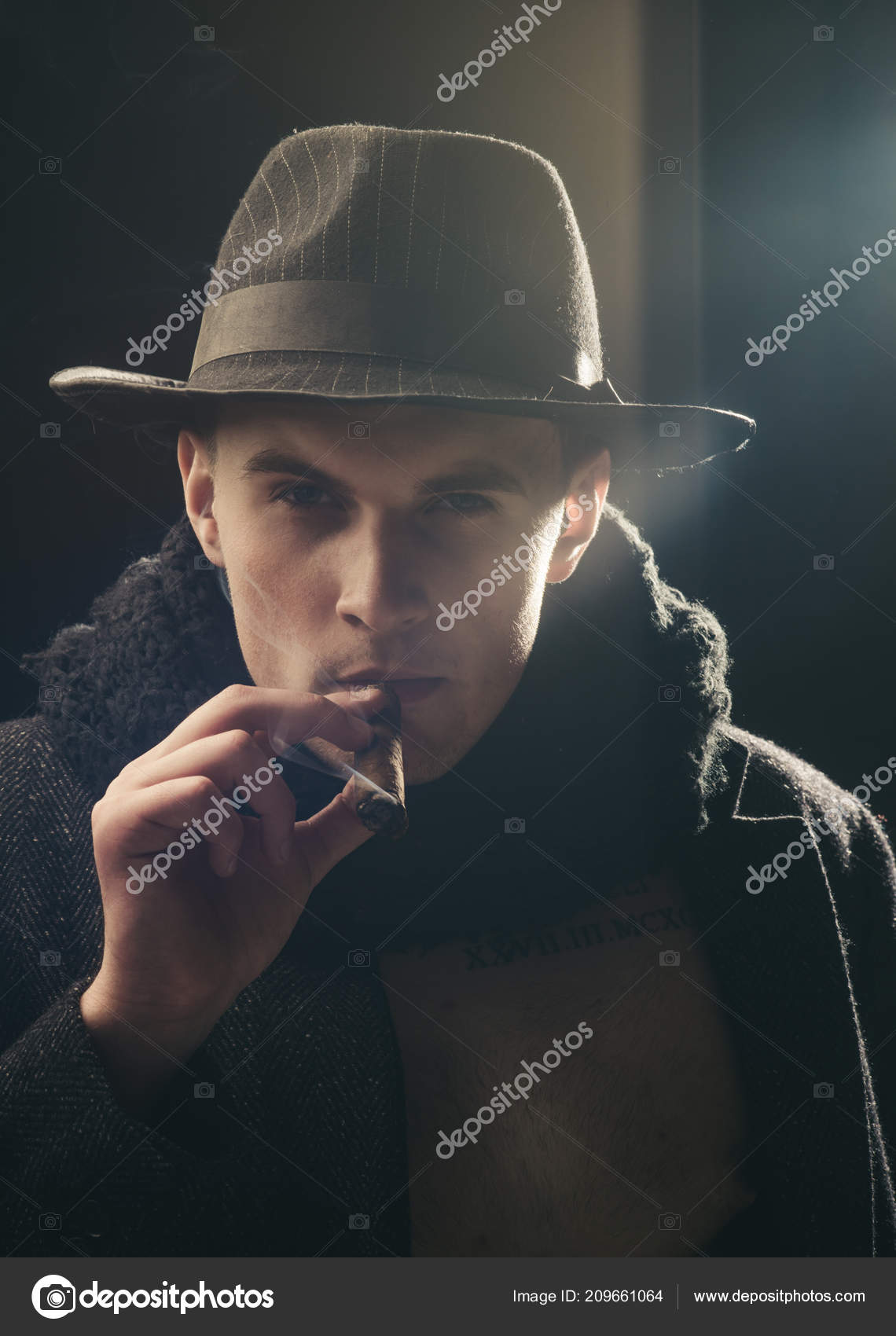 Vintage detective Man in coat, hat smoking cigar, dark