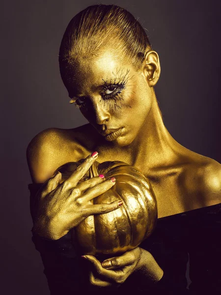 Arany nő halloween tök — Stock Fotó