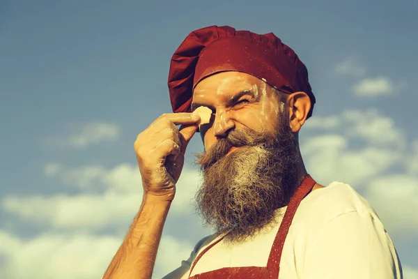 Bearded cook with dough — Stock Photo, Image